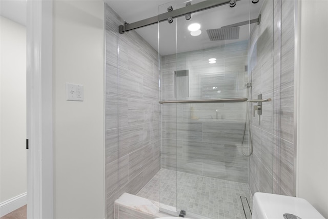 bathroom featuring a stall shower