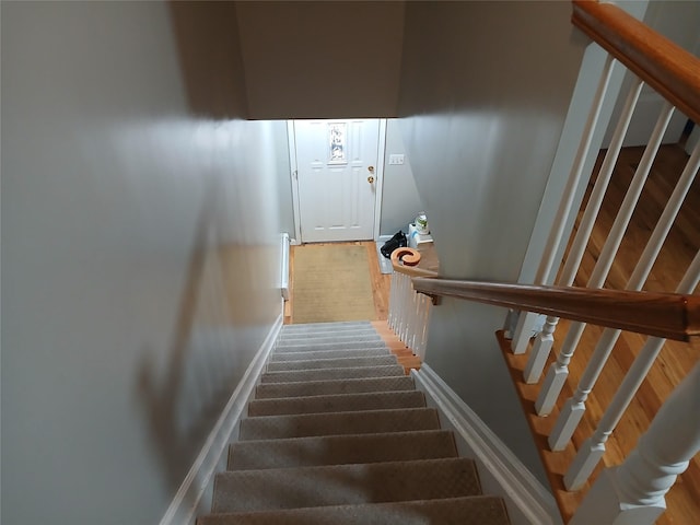 stairway with baseboards