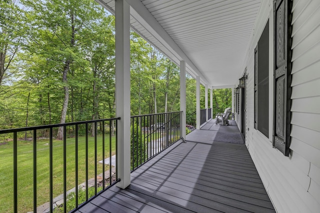 309 Quannacut Rd, Pine Bush, NY 12566 - wooden porch with a yard and view of wooded area