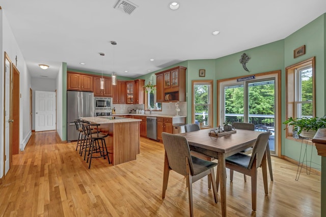 309 Quannacut Rd, Pine Bush, NY 12566 - dining room with light wood-style floors, recessed lighting, and baseboards