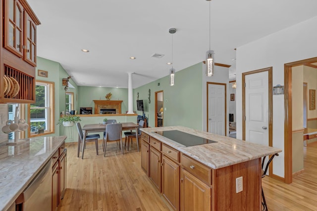 309 Quannacut Rd, Pine Bush, NY 12566 - kitchen featuring dishwasher, light wood finished floors, black electric cooktop, light stone countertops, and open floor plan