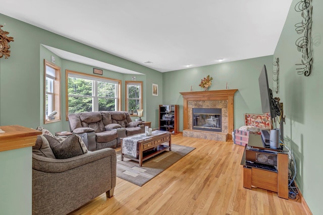 309 Quannacut Rd, Pine Bush, NY 12566 - living area featuring light wood-style floors and a tile fireplace