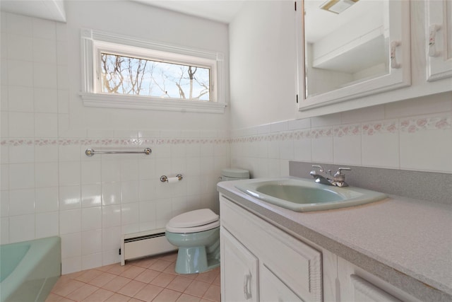 bathroom featuring a baseboard radiator, toilet, tile patterned floors, and tile walls