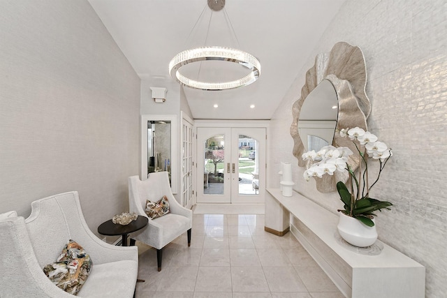 corridor with lofted ceiling, tile patterned flooring, and french doors