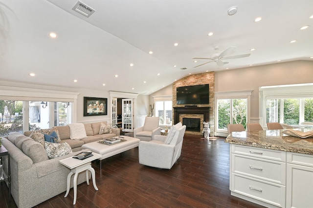 living room featuring recessed lighting, vaulted ceiling, visible vents, dark wood-type flooring, and ceiling fan