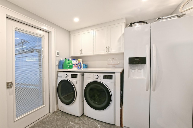 clothes washing area with separate washer and dryer, cabinet space, marble finish floor, and recessed lighting
