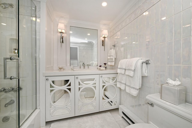 bathroom with tile patterned floors, toilet, tile walls, baseboard heating, and enclosed tub / shower combo