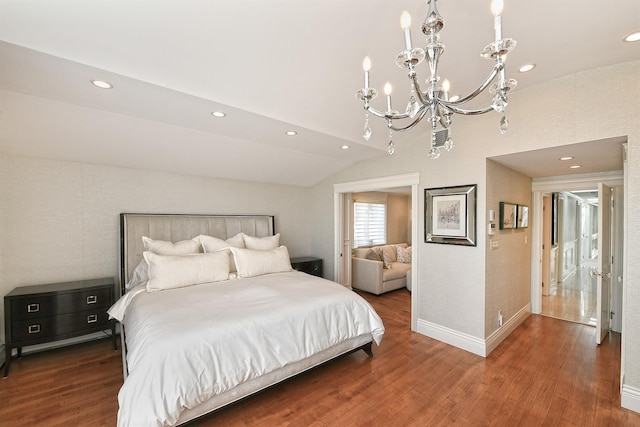 bedroom with recessed lighting, wood finished floors, baseboards, and an inviting chandelier