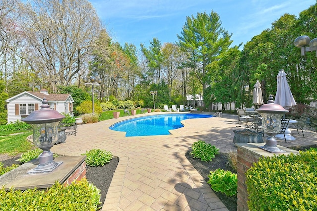 pool featuring a patio area
