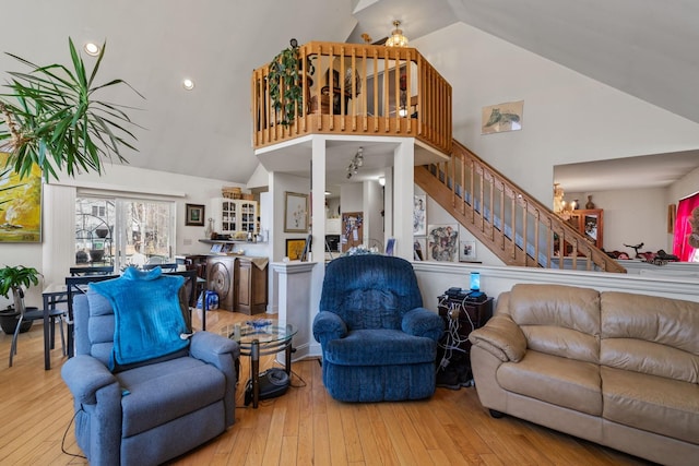 225 Toleman Rd, Washingtonville, NY 10992 - living room featuring hardwood / wood-style flooring, high vaulted ceiling, and stairway