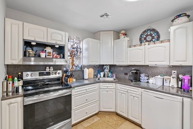 225 Toleman Rd, Washingtonville, NY 10992 - kitchen featuring visible vents, white dishwasher, dark countertops, stainless steel range with electric stovetop, and white cabinetry