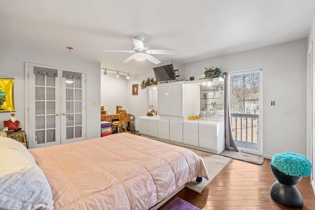 225 Toleman Rd, Washingtonville, NY 10992 - bedroom with a ceiling fan, french doors, access to exterior, hardwood / wood-style flooring, and track lighting