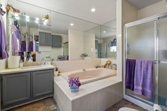 225 Toleman Rd, Washingtonville, NY 10992 - bathroom featuring vanity, a shower stall, recessed lighting, and a bath