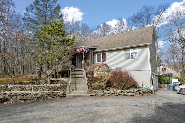 225 Toleman Rd, Washingtonville, NY 10992 - view of front facade with roof with shingles, stairs, and aphalt driveway