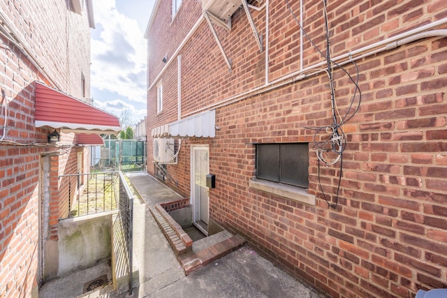 view of home's exterior featuring brick siding