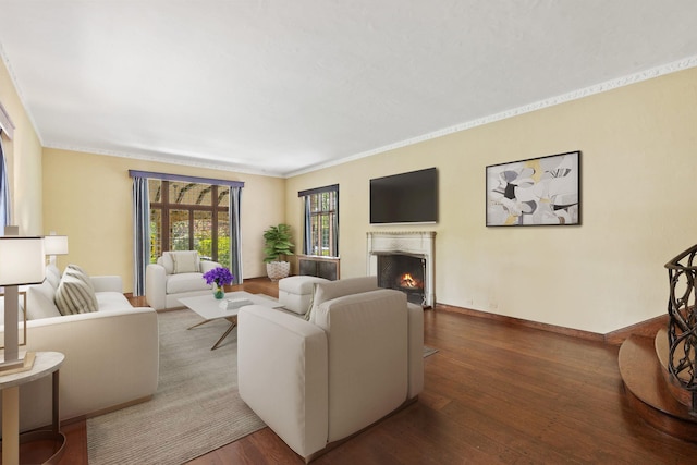 86 Hereford Rd, Bronxville, NY 10708 - living room featuring a premium fireplace, wood-type flooring, baseboards, and ornamental molding