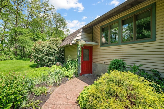 370 Forest Rd, Wallkill, NY 12589 - view of exterior entry with a yard