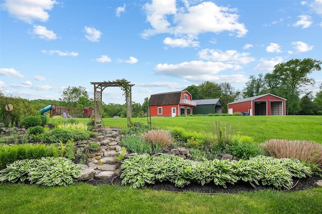 370 Forest Rd, Wallkill, NY 12589 - view of green lawn with an outbuilding and a garage