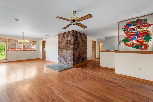 370 Forest Rd, Wallkill, NY 12589 - unfurnished living room with a chandelier, a ceiling fan, light wood finished floors, and baseboards