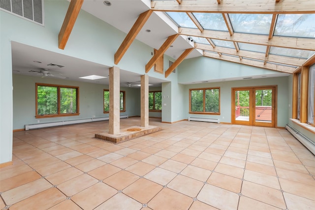 370 Forest Rd, Wallkill, NY 12589 - unfurnished sunroom with a baseboard heating unit, a skylight, and plenty of natural light