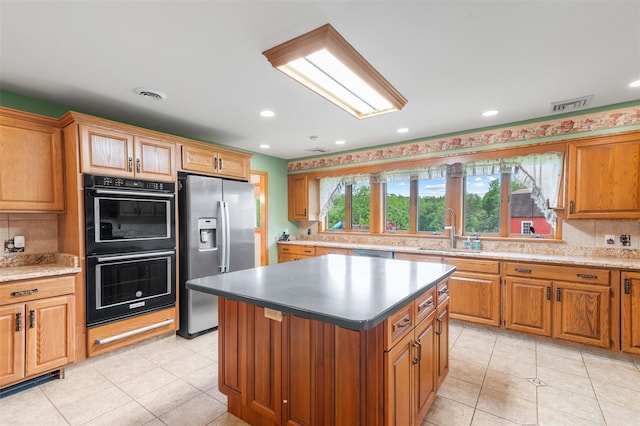 370 Forest Rd, Wallkill, NY 12589 - kitchen featuring stainless steel appliances, a sink, backsplash, light tile patterned flooring, and recessed lighting