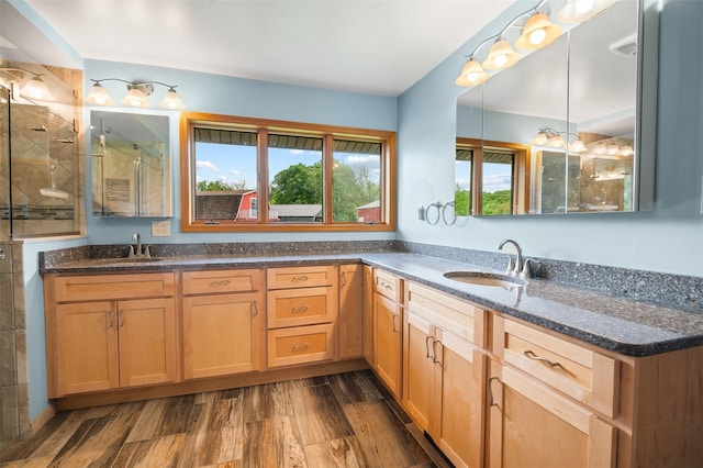 370 Forest Rd, Wallkill, NY 12589 - full bath with double vanity, wood finished floors, and a tile shower