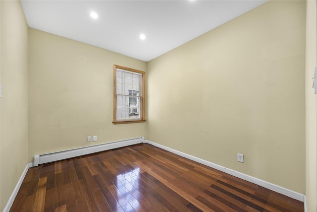 unfurnished room with a baseboard radiator, hardwood / wood-style floors, baseboards, and recessed lighting