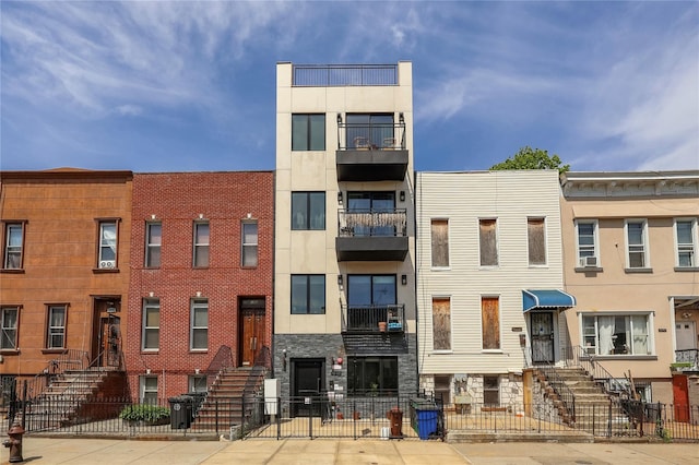 1043 Halsey St Unit 4, Brooklyn, NY 11207 - view of property with a fenced front yard