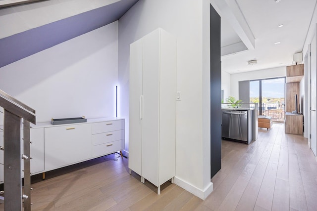 1043 Halsey St Unit 4, Brooklyn, NY 11207 - hallway with light wood-style floors and baseboards