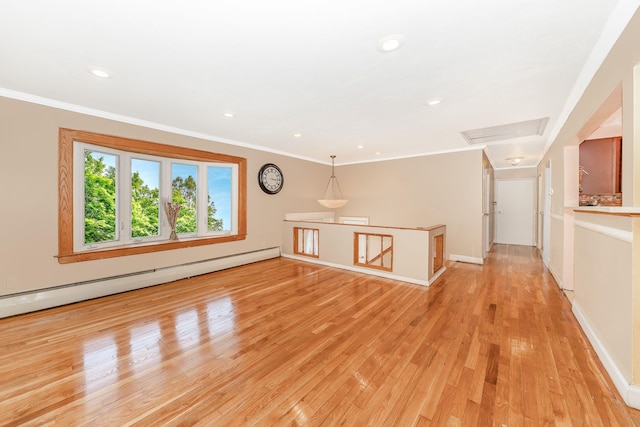 unfurnished living room with ornamental molding, baseboards, recessed lighting, a baseboard heating unit, and light wood finished floors