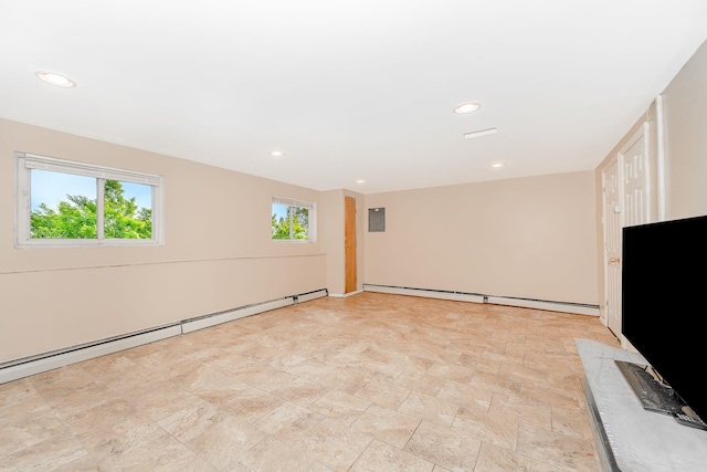 unfurnished living room featuring stone finish floor, electric panel, a baseboard heating unit, and recessed lighting