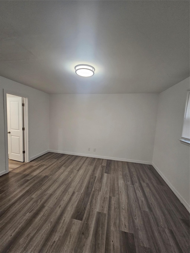 648 Lybolt Rd, Middletown, NY 10941 - unfurnished room with baseboards and dark wood-style floors