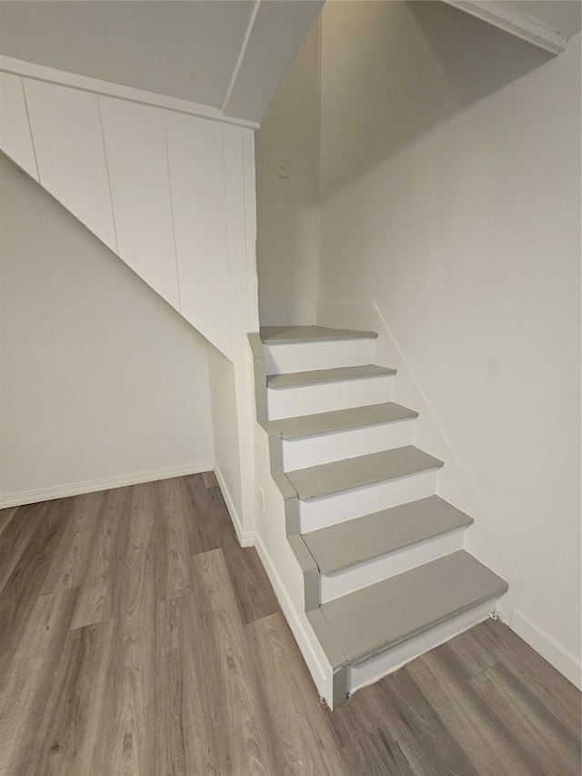 648 Lybolt Rd, Middletown, NY 10941 - staircase featuring wood finished floors and baseboards