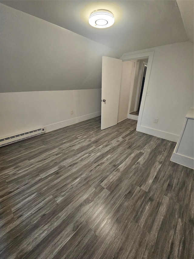 648 Lybolt Rd, Middletown, NY 10941 - bonus room with a baseboard radiator, dark wood finished floors, lofted ceiling, and baseboards