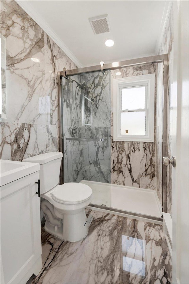 bathroom featuring marble finish floor, toilet, crown molding, and visible vents