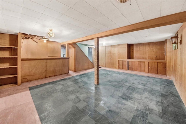 finished below grade area with wood walls