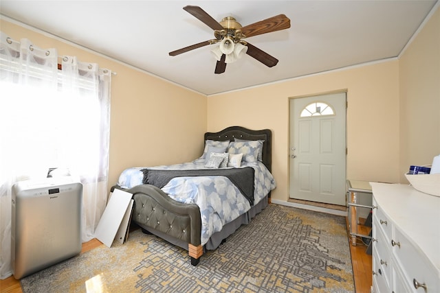 174-20 Jewel Ave, Fresh Meadows, NY 11365 - bedroom featuring a ceiling fan, multiple windows, and wood finished floors