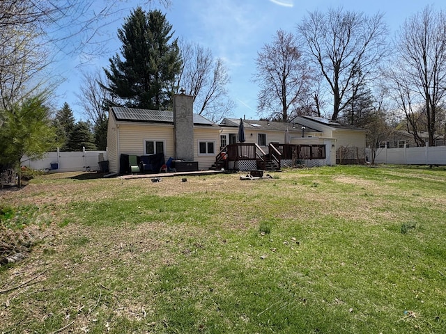 43 Overlook Rd, Monroe, NY 10950 - back of property with fence, a lawn, a chimney, and a deck