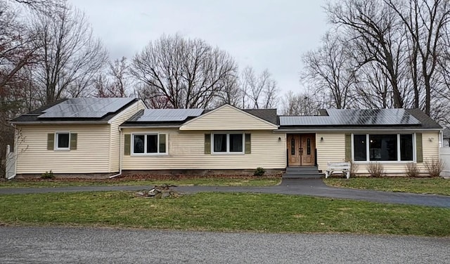 43 Overlook Rd, Monroe, NY 10950 - single story home with entry steps, a front yard, and solar panels