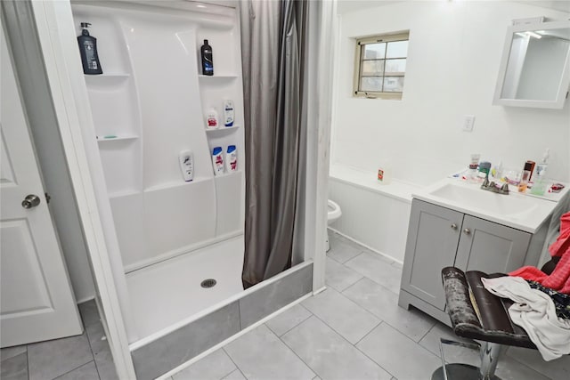 full bath with toilet, vanity, a shower with shower curtain, and tile patterned flooring