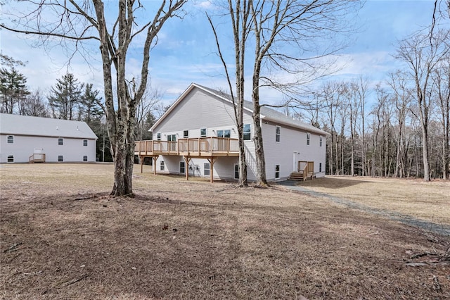 rear view of property with a deck