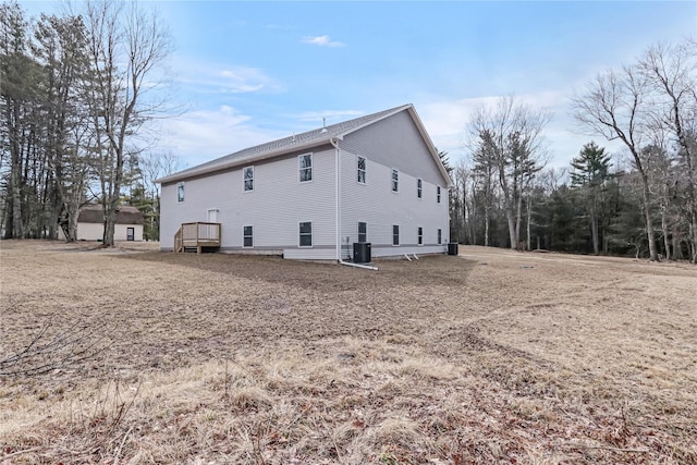 view of side of property featuring central AC unit
