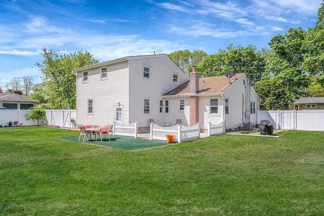 53 Abinet Ct, Selden, NY 11784 - back of house featuring a chimney, a patio area, and central AC unit