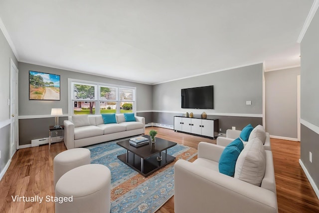53 Abinet Ct, Selden, NY 11784 - living area featuring a baseboard heating unit, ornamental molding, wood finished floors, and baseboards