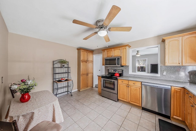 53 Abinet Ct, Selden, NY 11784 - kitchen featuring stainless steel appliances, a ceiling fan, backsplash, and light tile patterned floors
