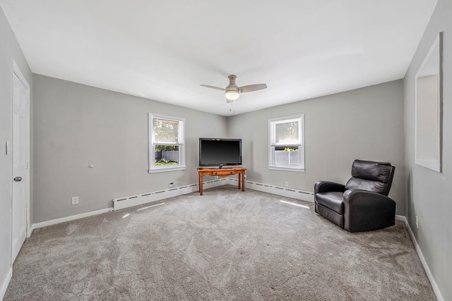 53 Abinet Ct, Selden, NY 11784 - sitting room featuring baseboards, carpet floors, ceiling fan, and a baseboard radiator
