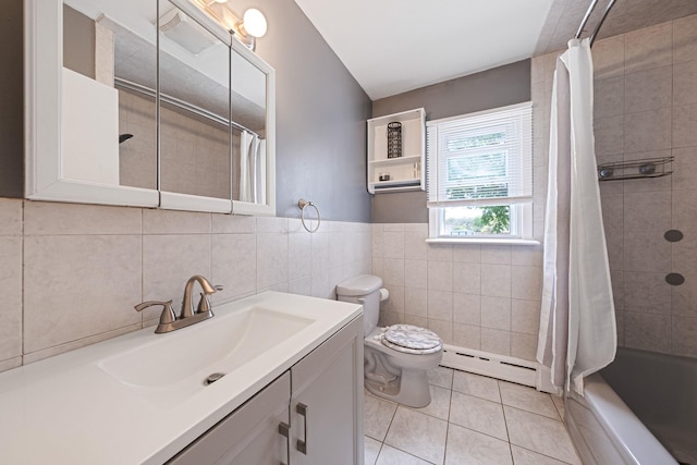 53 Abinet Ct, Selden, NY 11784 - full bath with baseboard heating, tile patterned floors, toilet, tile walls, and vanity