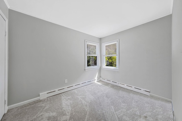 53 Abinet Ct, Selden, NY 11784 - empty room with carpet floors, crown molding, baseboards, and baseboard heating