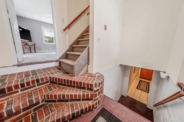 53 Abinet Ct, Selden, NY 11784 - staircase featuring a baseboard heating unit