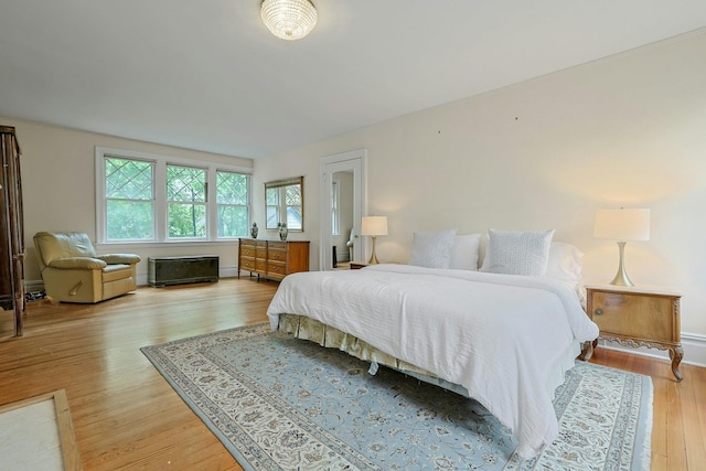 bedroom with light wood finished floors